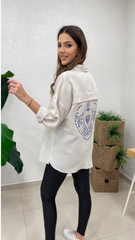 Oversize beige shirt with thread embroidery
